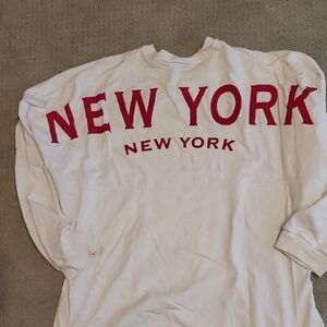 Spirit White Sweatshirt with NEW YORK Written On Back